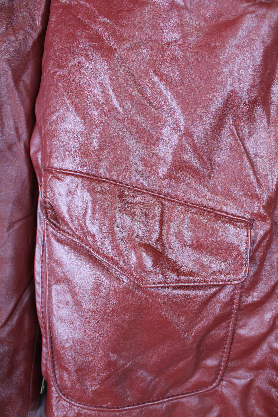 Vintage 1970's Chess King oxblood zip through leather jacket with multiple pockets