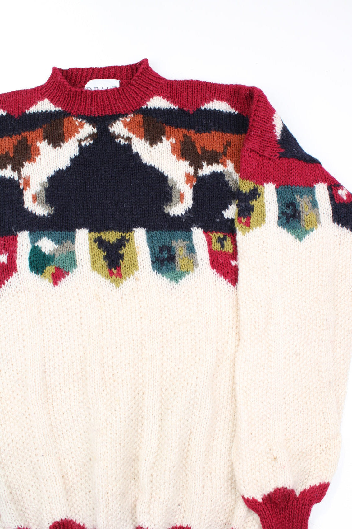 Vintage looks likes 80s/90s cream knitted jumper with dog motif along the chest and shoulders