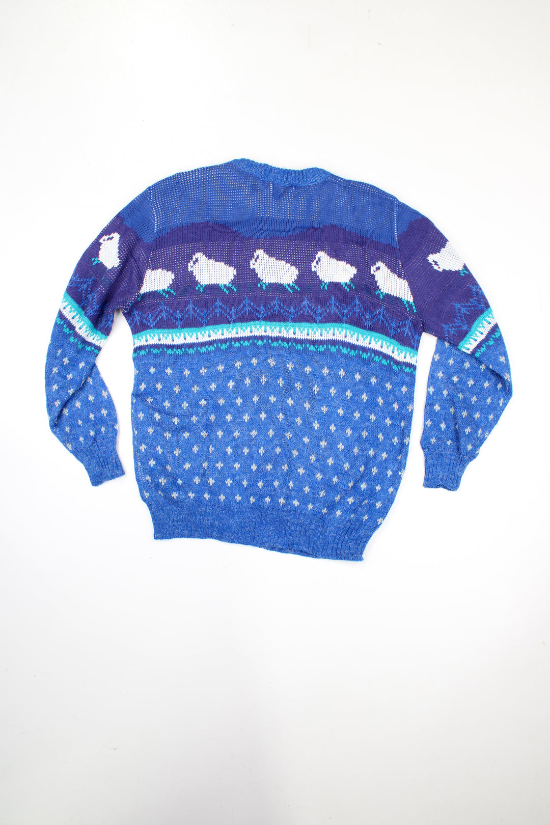 Vintage 1980's made in USA blue knitted crew neck jumper, features sheep design 