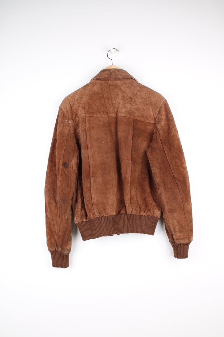 Vintage 1970's brown suede bomber jacket by Chalenger features full zip and multiple pockets 