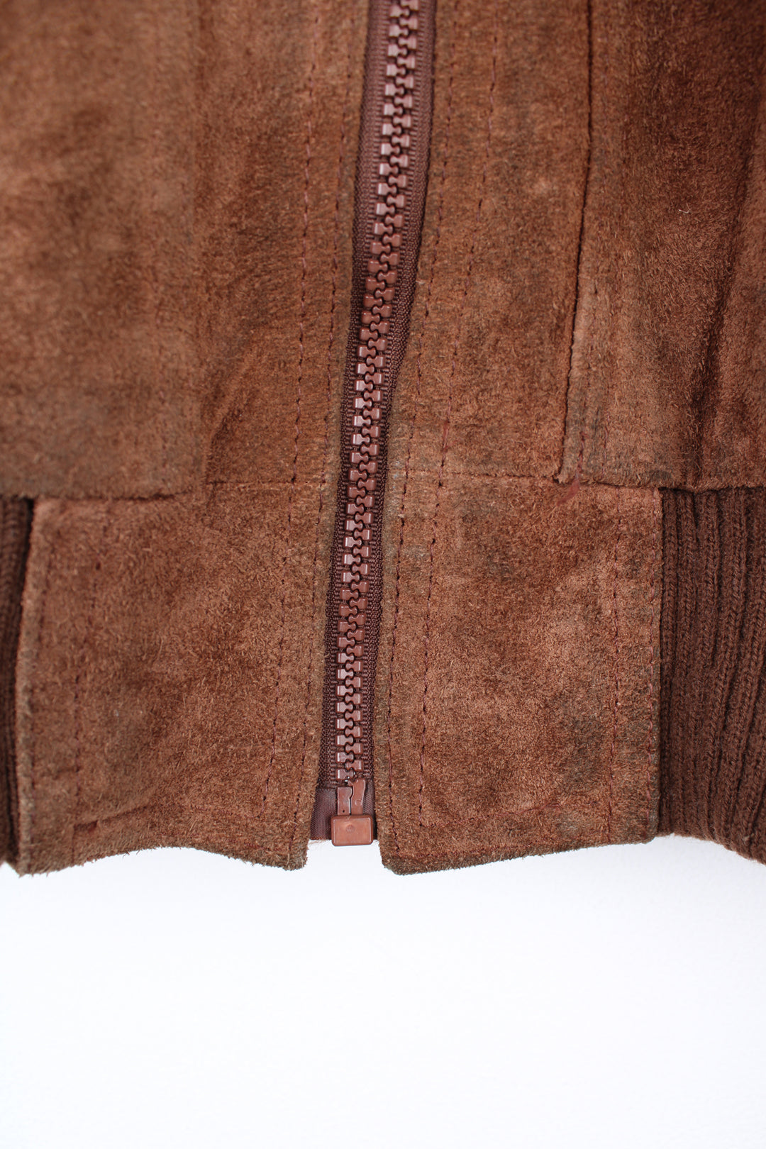 Vintage 1970's brown suede bomber jacket by Chalenger features full zip and multiple pockets 