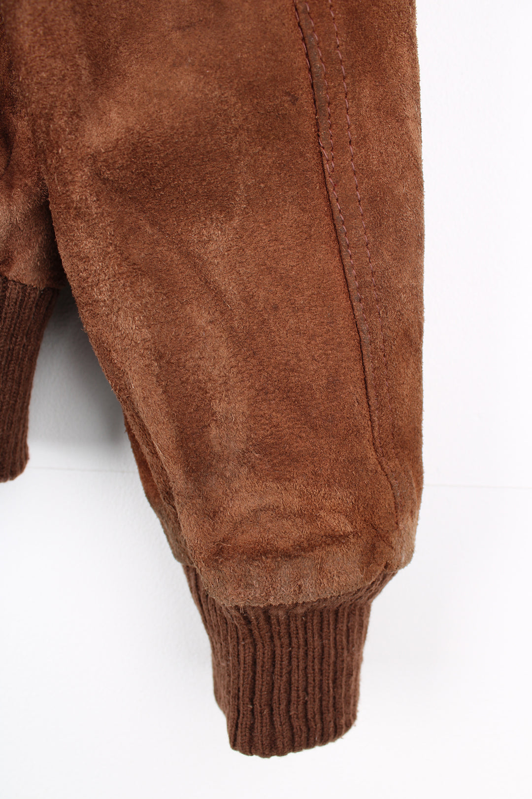 Vintage 1970's brown suede bomber jacket by Chalenger features full zip and multiple pockets 