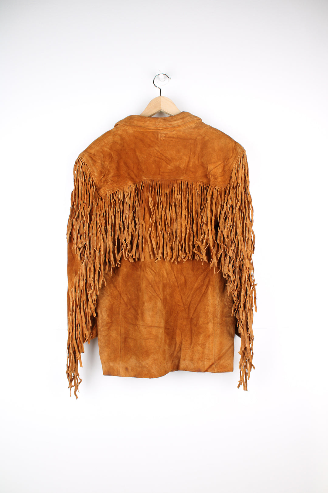 Vintage 80's blazer style suede jacket with fringe across the arms, back and chest. Fully lined with one button to close. good condition - creases to the suede in places and some discolouration (see photos) Size in Label: No Size - Measures like a Mens S