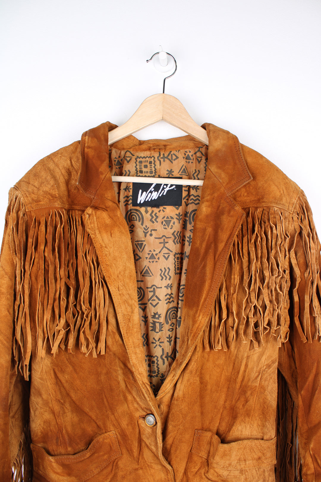 Vintage 80's blazer style suede jacket with fringe across the arms, back and chest. Fully lined with one button to close. good condition - creases to the suede in places and some discolouration (see photos) Size in Label: No Size - Measures like a Mens S