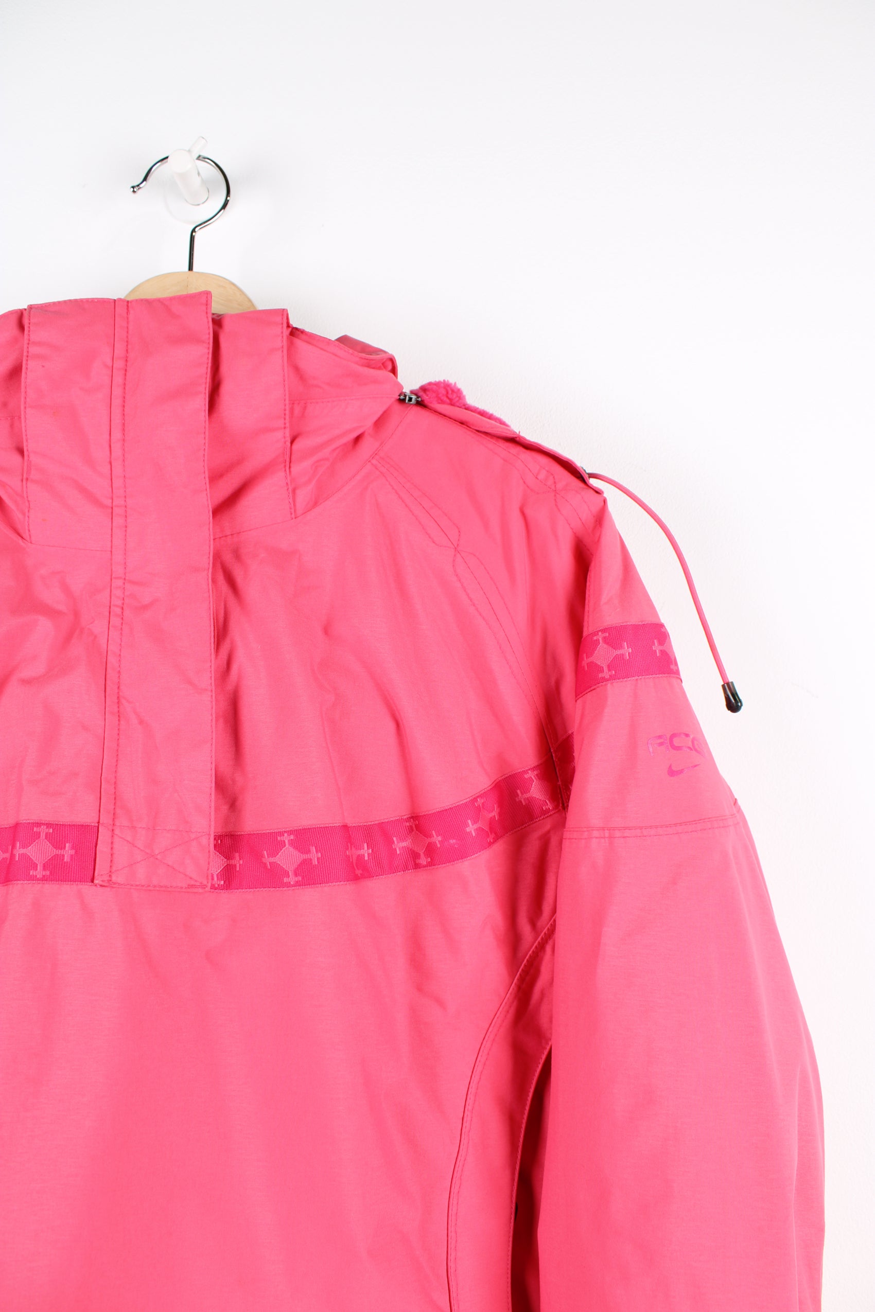 Nike Fit Storm ACG bright pink ski style smock jacket features fleece lining and removable hood