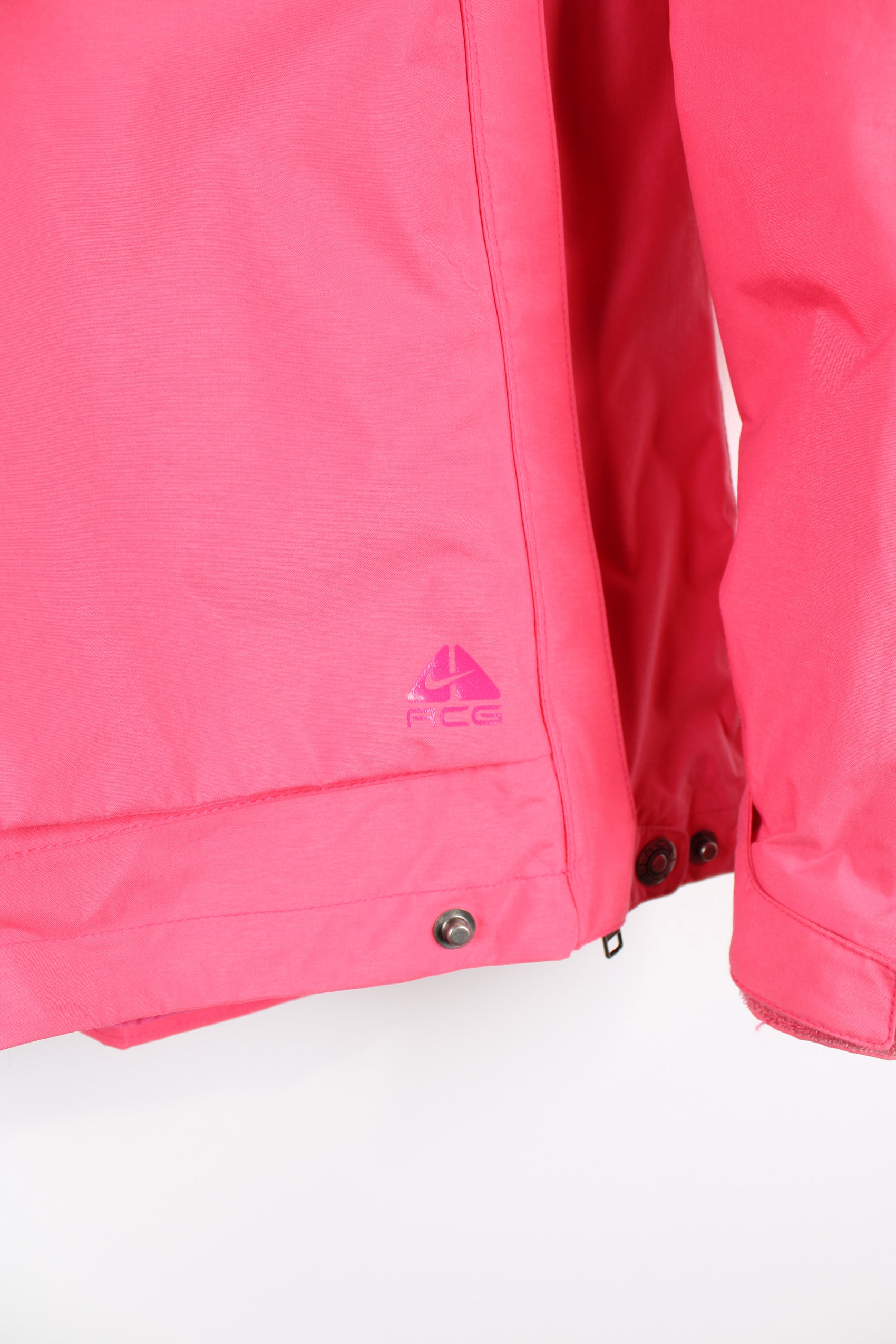 Nike Fit Storm ACG bright pink ski style smock jacket features fleece lining and removable hood