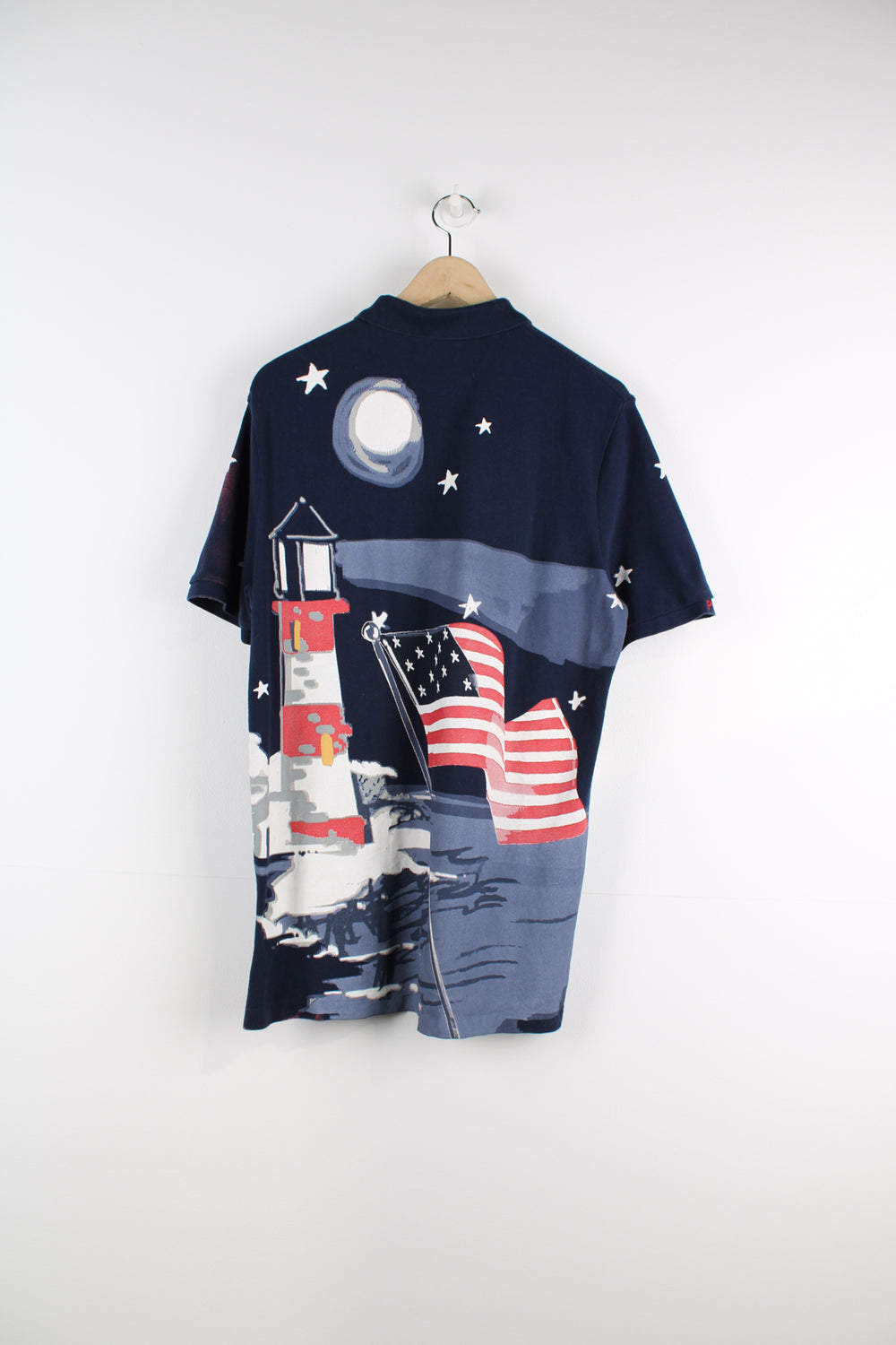 Ralph Lauren Nautical Bear Polo Shirt in a blue colourway with all over sailor bear print graphic on the front and back, 1/4 button up.