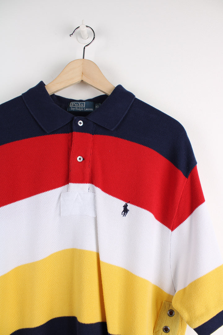 Ralph Lauren Polo Shirt in a blue, red, white and yellow striped colourway, 1/4 button up and has the logo embroidered on the chest.