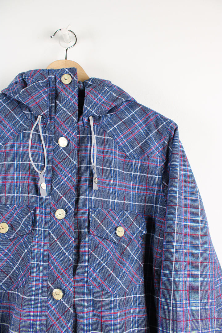 Nike Snowboarding blue and pink plaid jacket features multiple pockets 