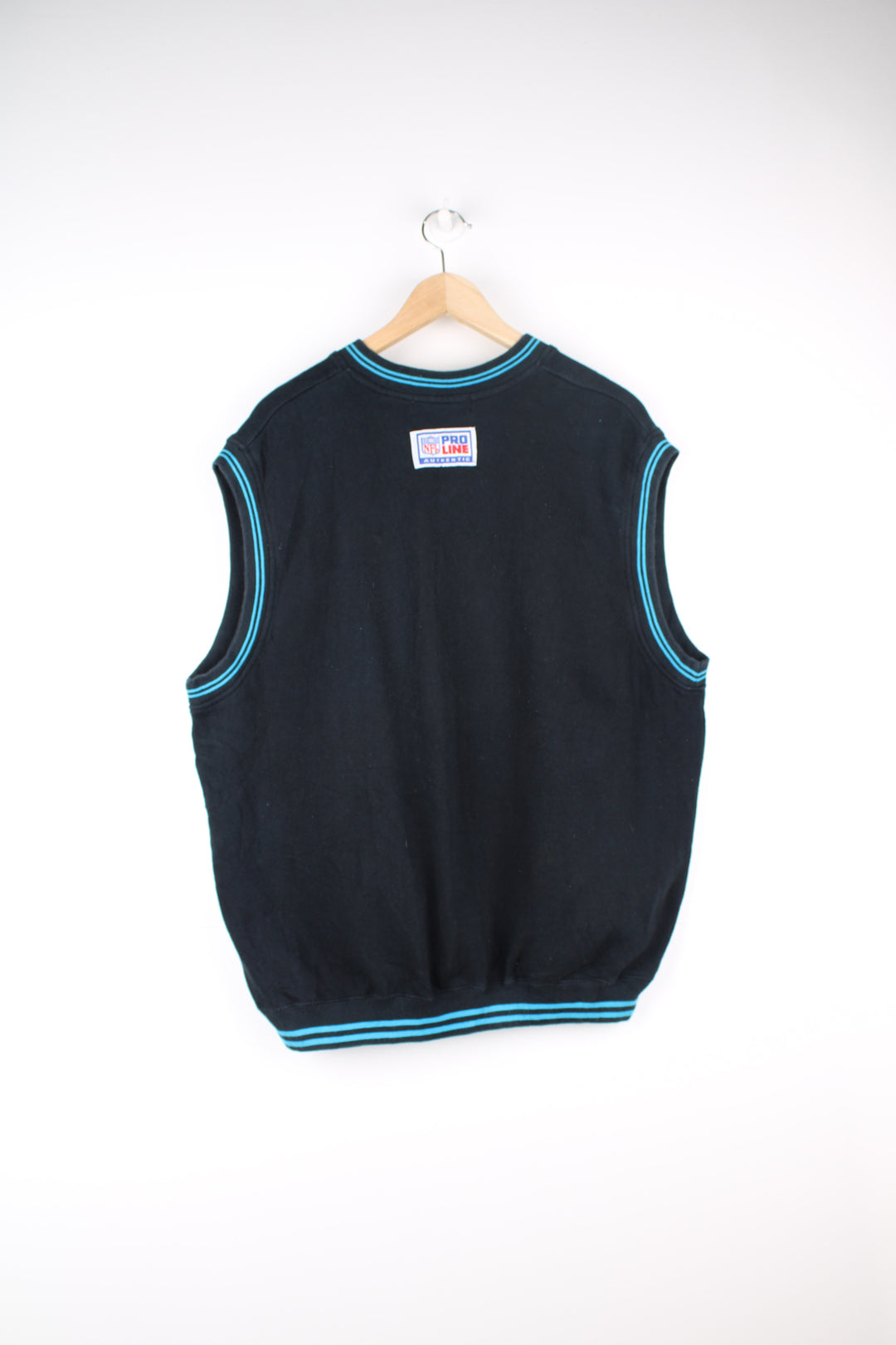 Reebok NFL Pro Line, Carolina Panthers Sweater Vest in a black and blue colourway, v neck, and has the logos embroidered on the front and back.