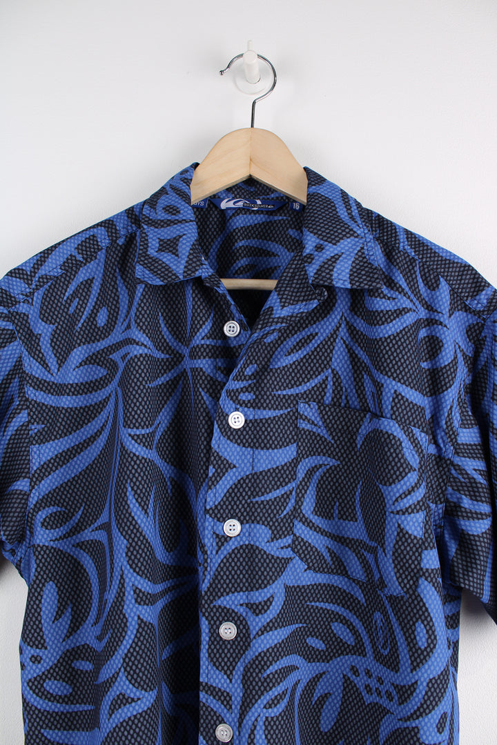 Quiksilver Short Sleeved Hawaiian Shirt in a blue and black colourway, button up with a chest pocket, and logo embroidered on the back.