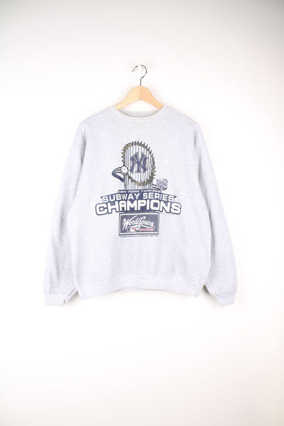 Vintage Lee Sport, New York Yankees 2000 World Series Champions Sweatshirt in a grey colourway, and has a big graphic print with the logo and spell out on the front.
