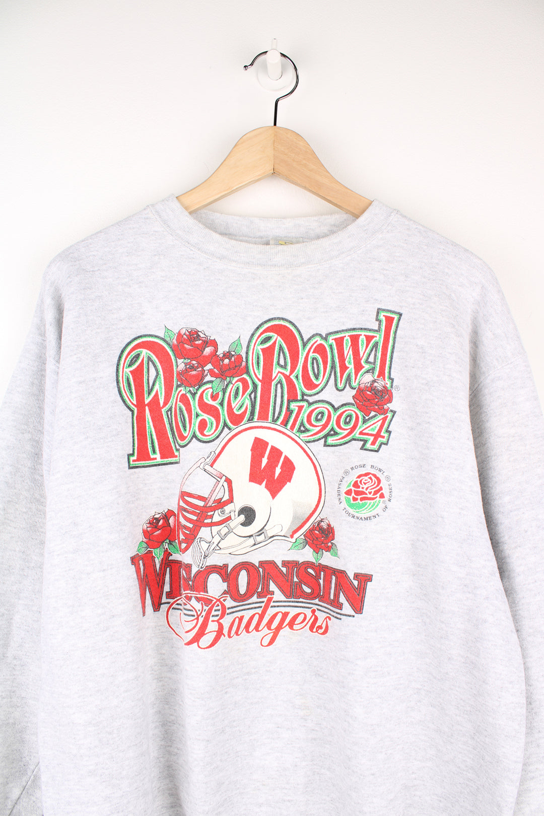 Vintage 1994 Wisconsin Badgers Rose Bowl Sweatshirt in a grey colourway, and has the logo and spell out printed on the front.