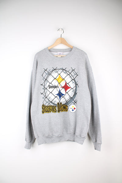Pittsburgh Steelers NFL Sweatshirt in a grey colourway, and has the logo printed on the front.