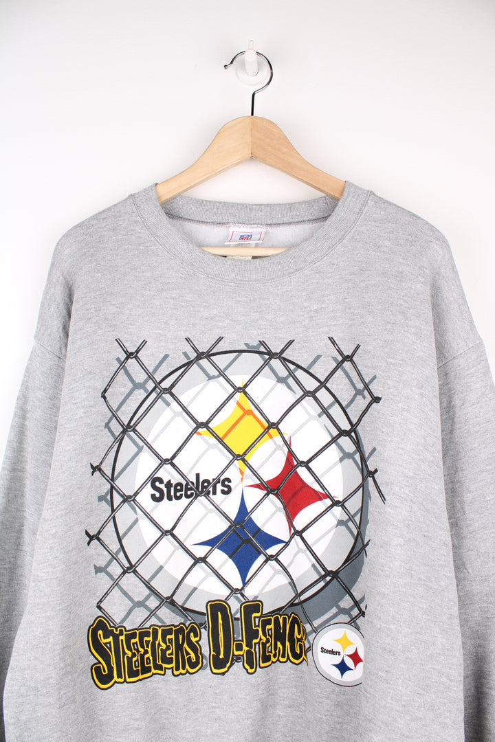 Pittsburgh Steelers NFL Sweatshirt in a grey colourway, and has the logo printed on the front.