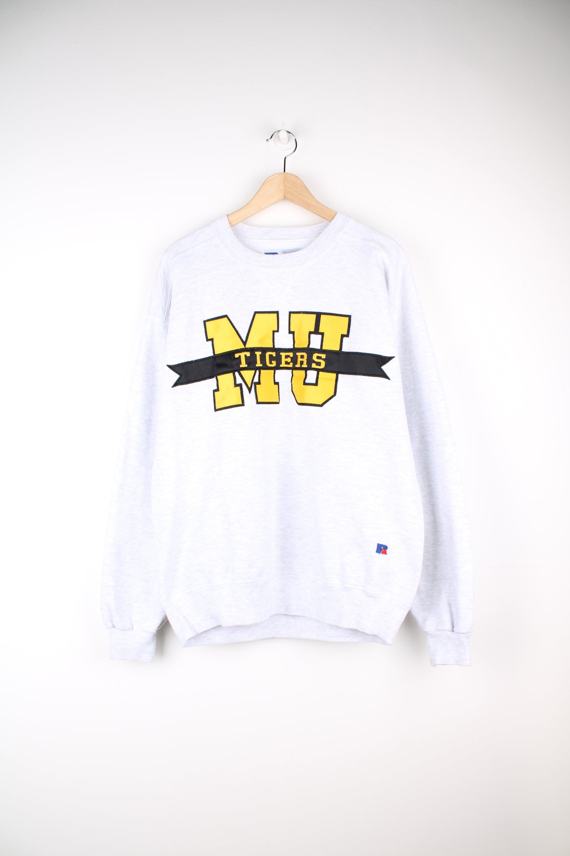 Missouri University Tigers Football Team Sweatshirt in a grey colourway, with big embroidered team initials on the front.