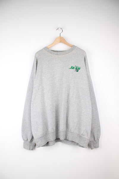 Vintage New York Jets NFL Sweatshirt in a grey colourway, and has the team logo embroidered on the front.