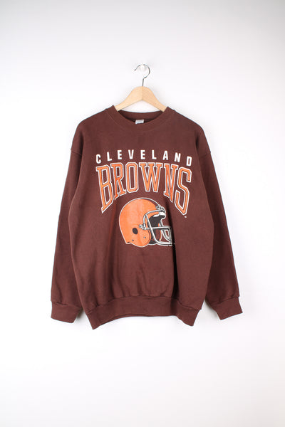 Vintage Cleveland Browns NFL Sweatshirt in a brown colourway with the team logo and spell out printed on the front.
