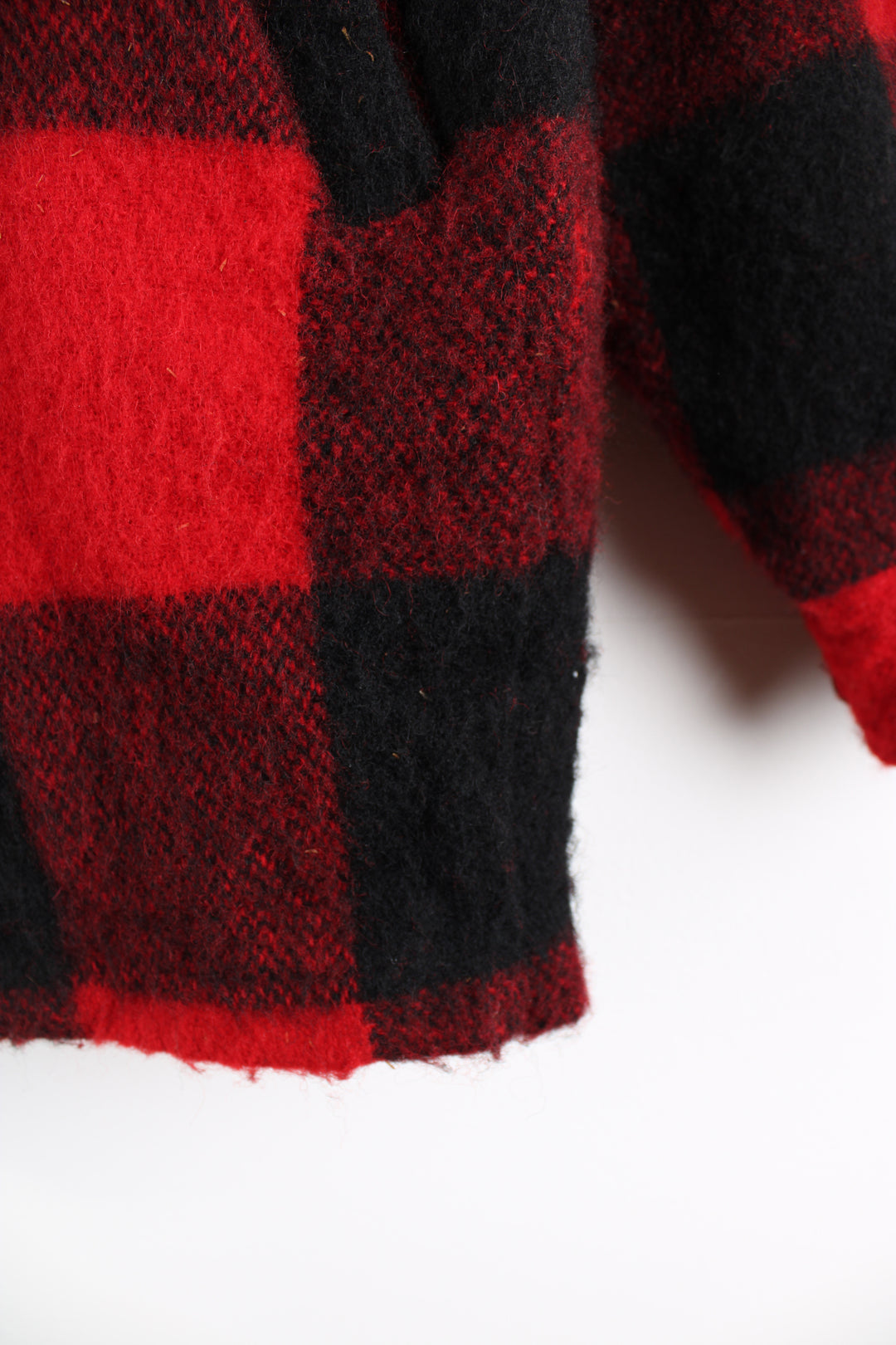 Vintage Woolrich red & black plaid wool CPO jacket, zip up with side pockets and fleece lining.