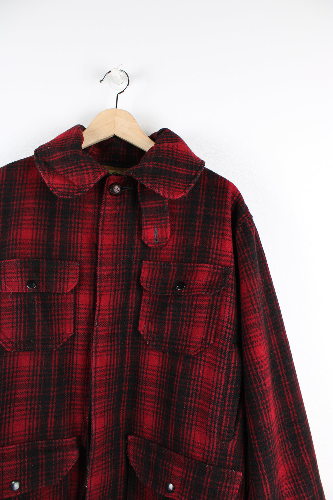 Vintage 80's Woolrich red & black plaid wool button up CPO jacket with multiple pockets.