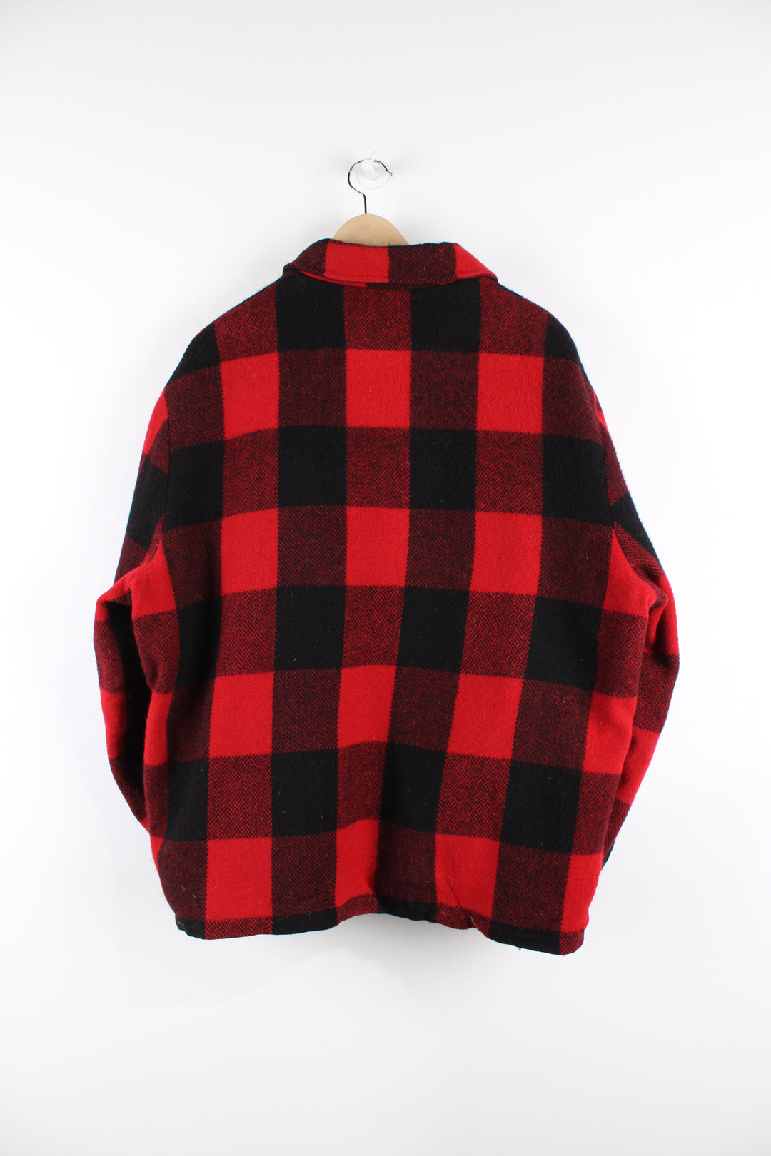 Vintage Woolrich red & black plaid wool CPO jacket, zip up with side pockets and fleece lining.