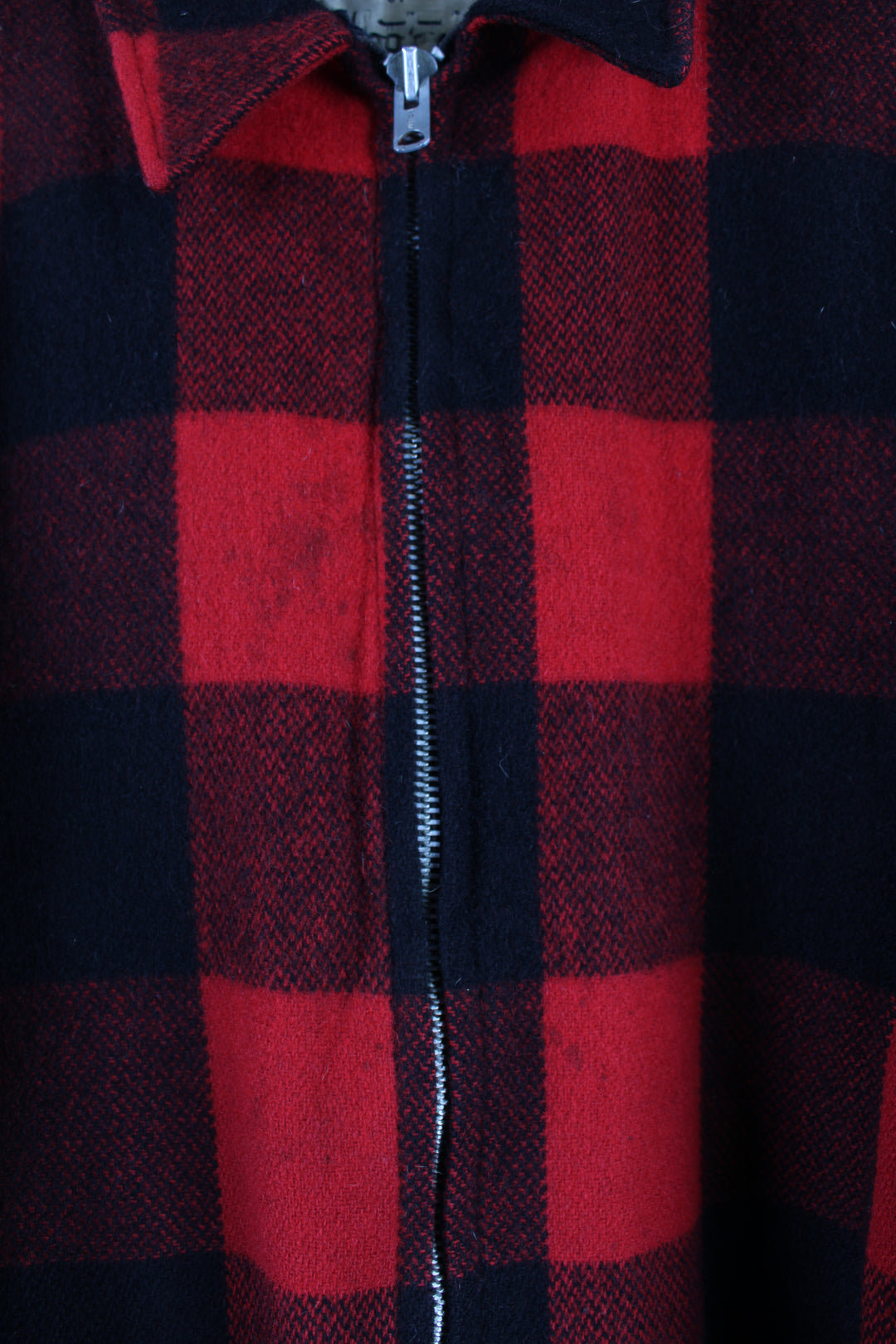 Vintage Woolrich red & black plaid wool CPO jacket, zip up with side pockets and fleece lining.