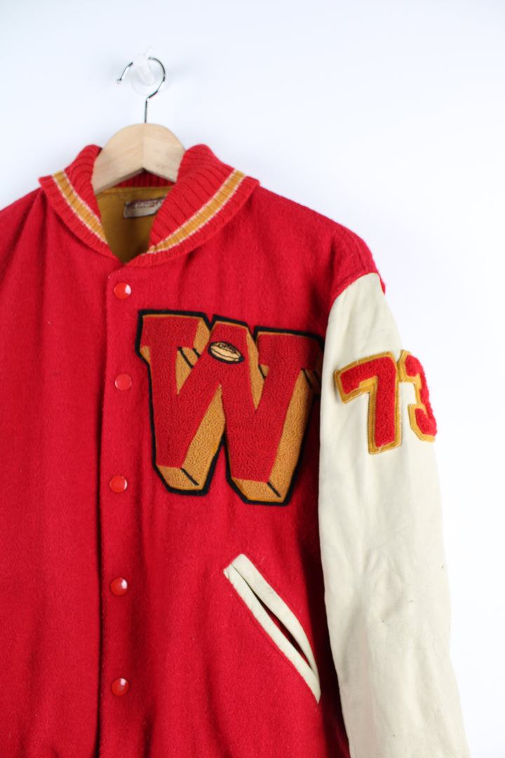 Vintage 70's college varsity jacket, button up with embroidered patches throughout the jacket. 