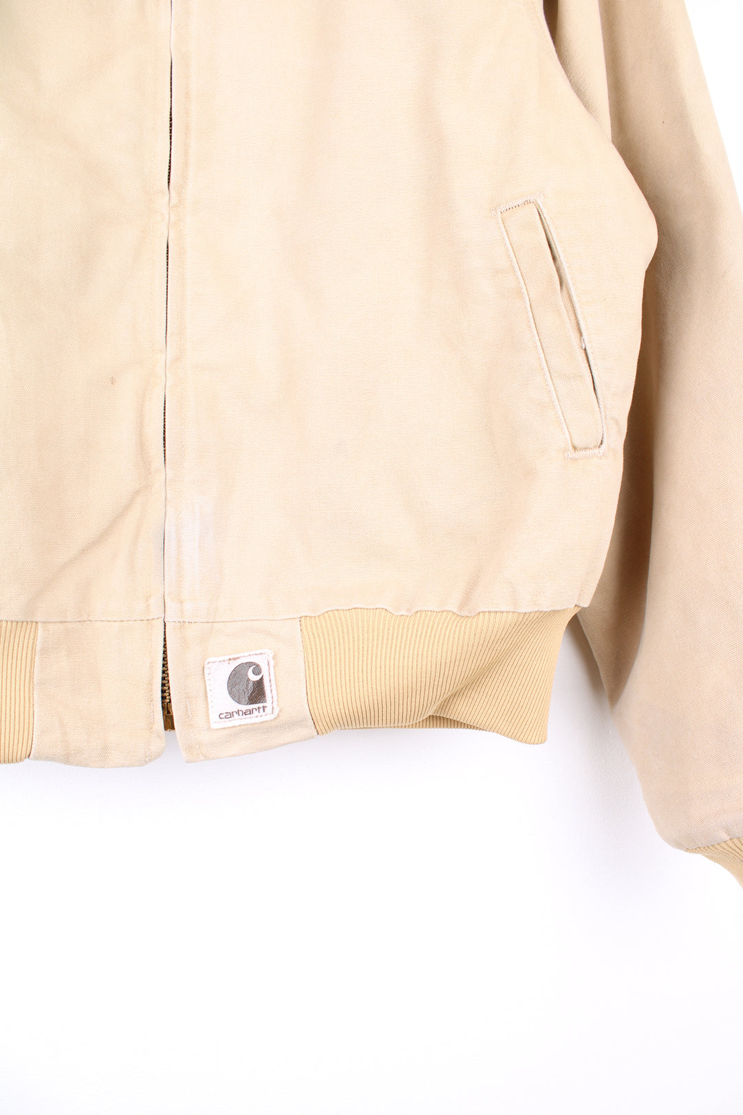 Carhartt Santa Fe Jacket in a tanned colourway with a corduroy collar, zip up, side pockets, and has the logo embroidered on the front.