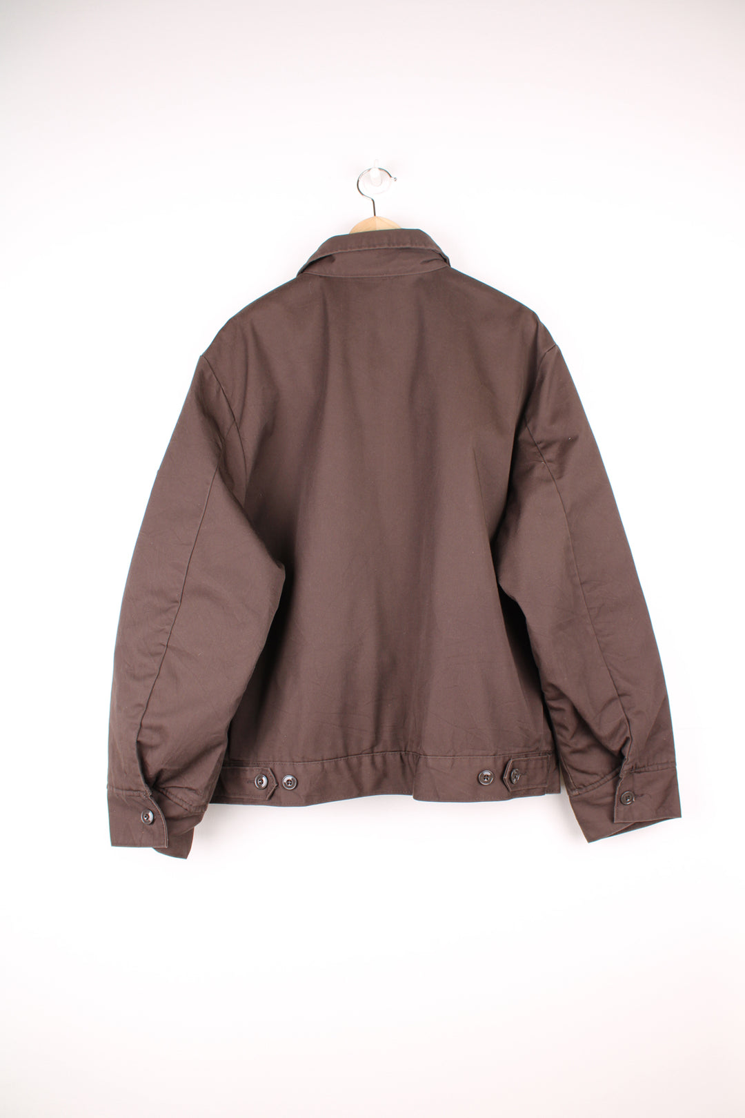 Dickies Eisenhower Workwear Jacket in a brown colourway, zip up with side pockets, quilted lining and has the logo embroidered on the front.