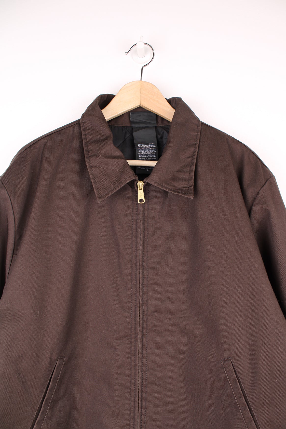 Dickies Eisenhower Workwear Jacket in a brown colourway, zip up with side pockets, quilted lining and has the logo embroidered on the front.