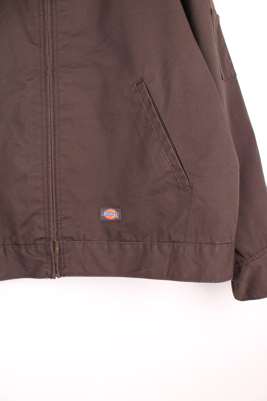 Dickies Eisenhower Workwear Jacket in a brown colourway, zip up with side pockets, quilted lining and has the logo embroidered on the front.