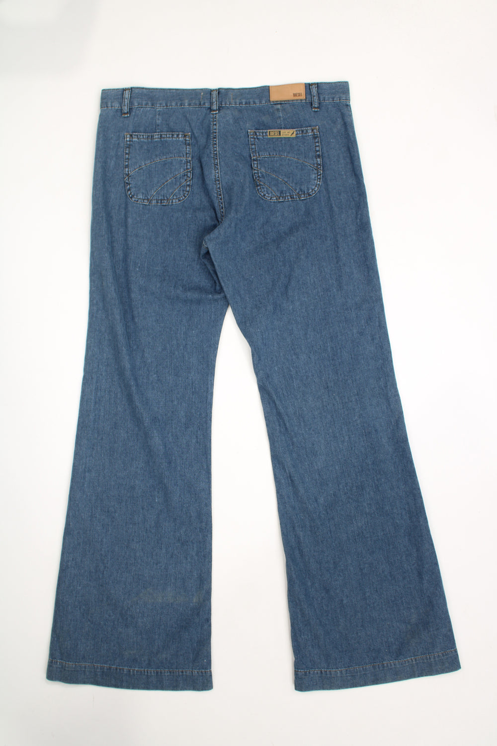 Diesel wide leg, mid rise jeans with signature logo on the pocket