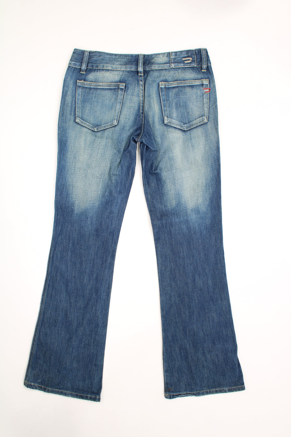 Y2K Diesel boot cut, low rise jeans with signature logo on the pocket 