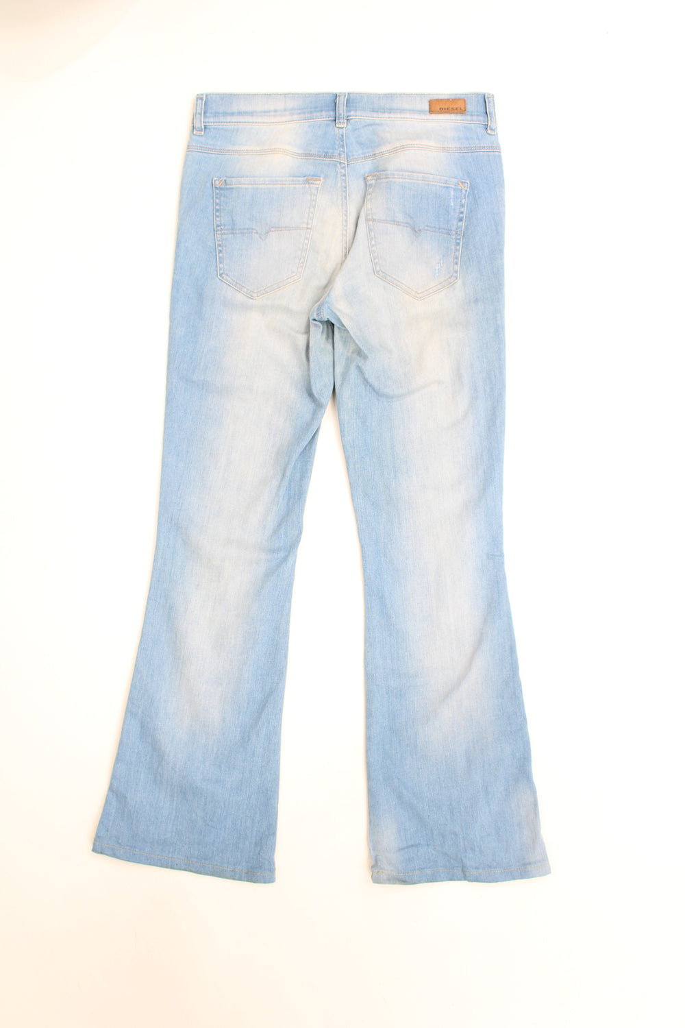 Vintage Y2K light wash Diesel stretchy slim leg, bootcut jeans with embroidered logo on the pocket