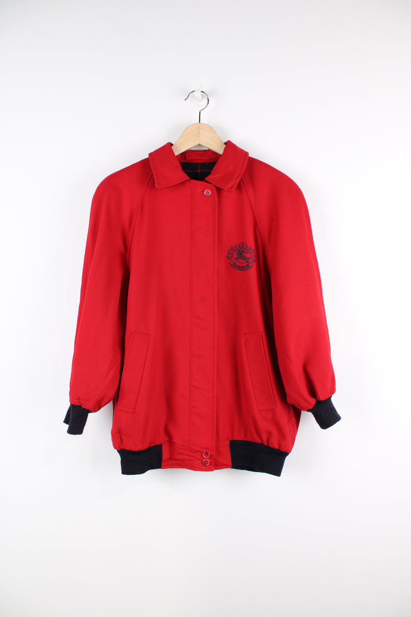 Vintage Burberry Harrington jacket in red, zip up, has two side pockets, tartan lining, cropped arm length and logo embroidered on the chest.