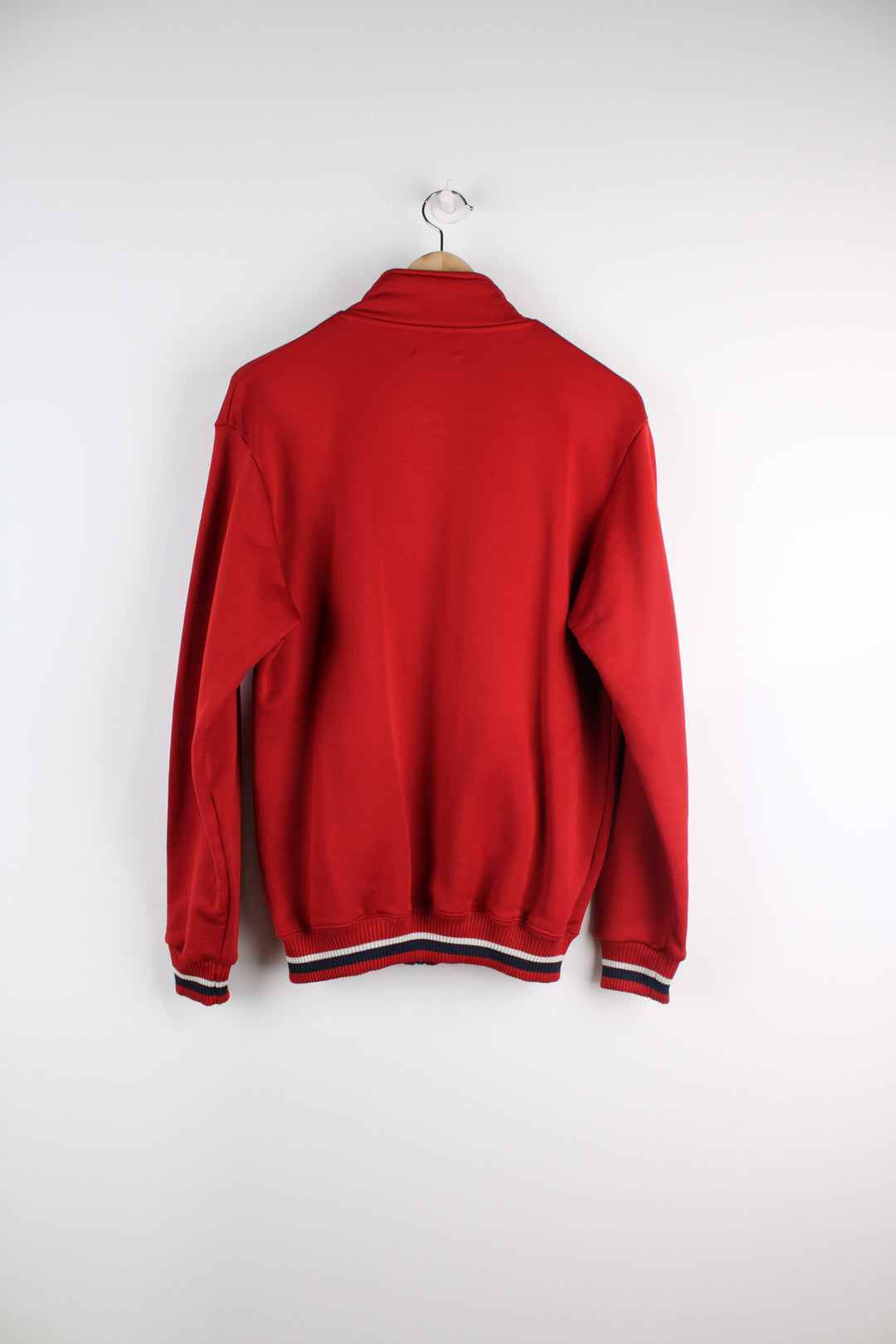 Vintage Fred Perry all red zip through tracksuit top, features signature embroidered logo on the chest 