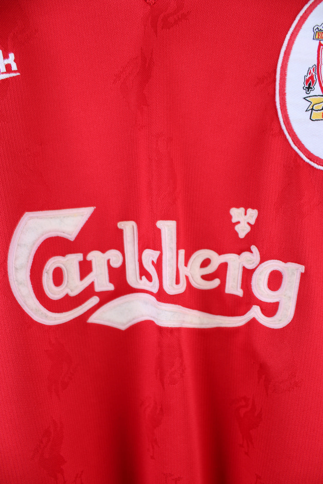 Vintage Liverpool Reebok Home kit 1996/98, Carlsberg sponsor, v neck, red team colourway with embroidered logos on the front.