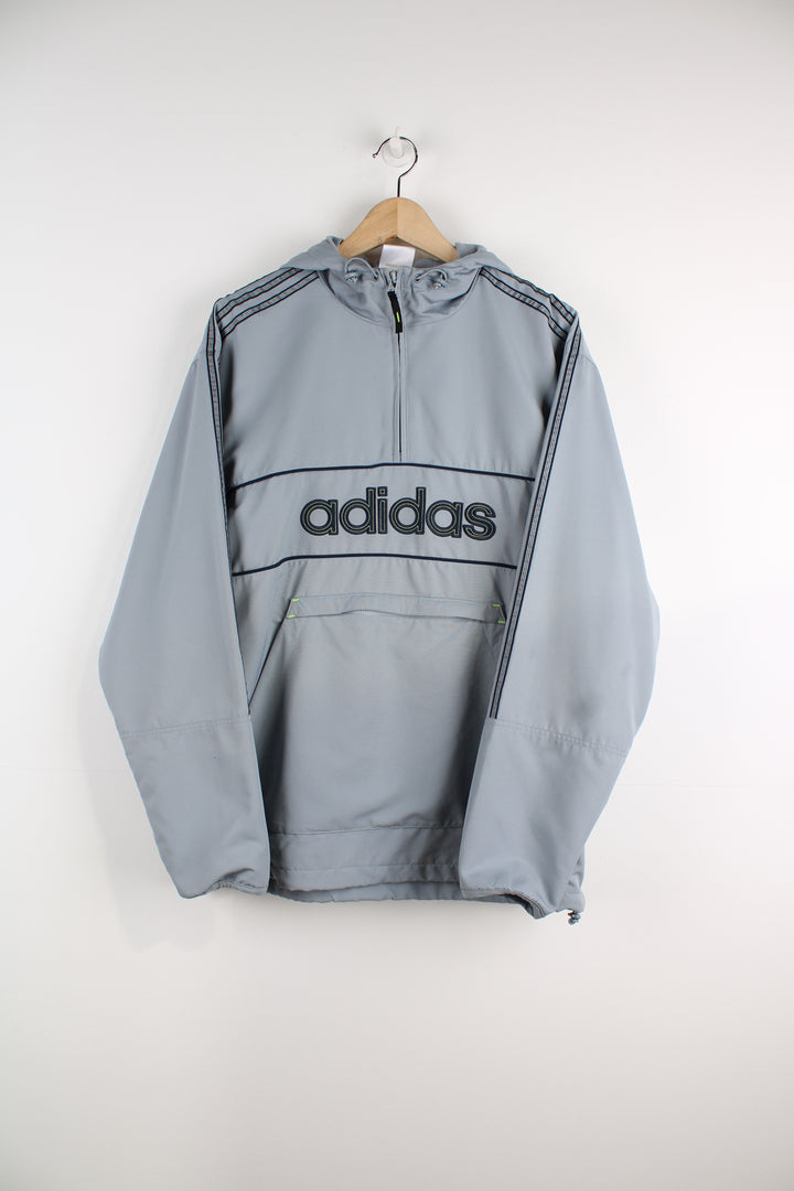 Vintage Adidas lightweight pullover in all grey, features embroidered spell-out logo across the chest with large zip up pocket in the front&nbsp;