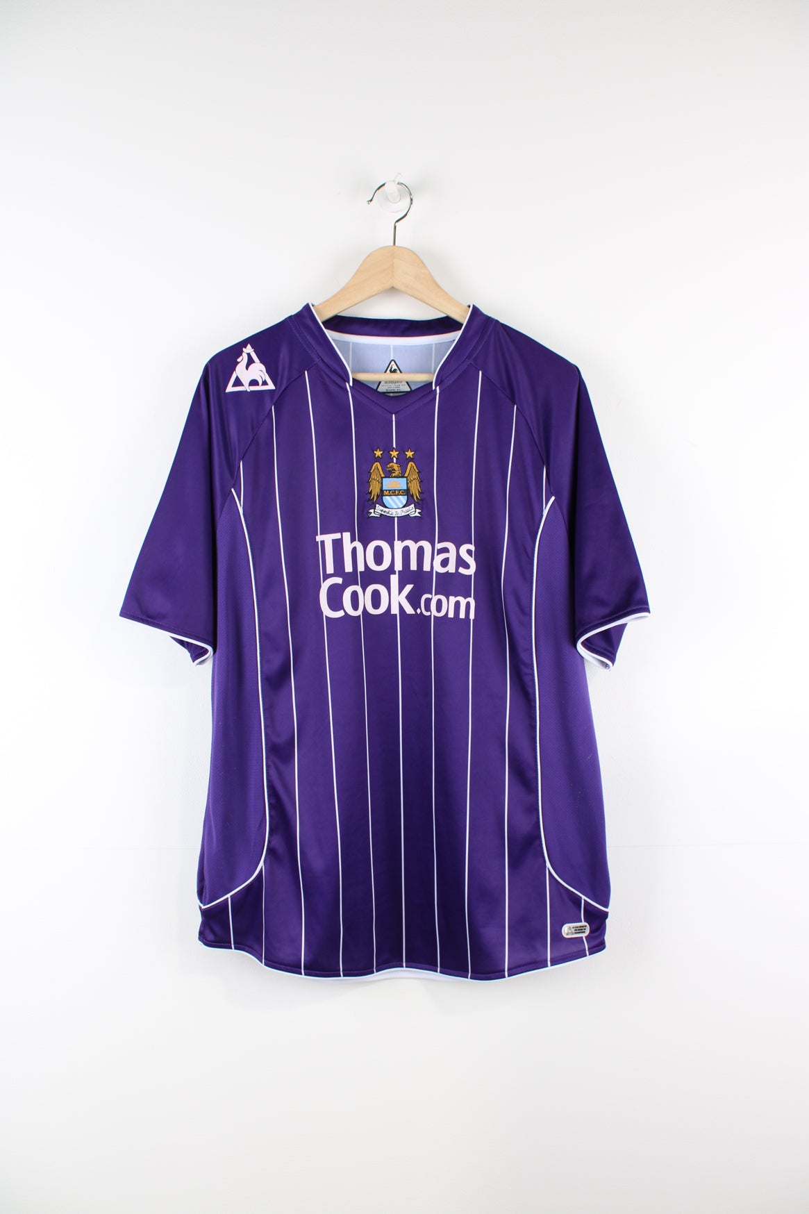 Man city purple and orange kit on sale