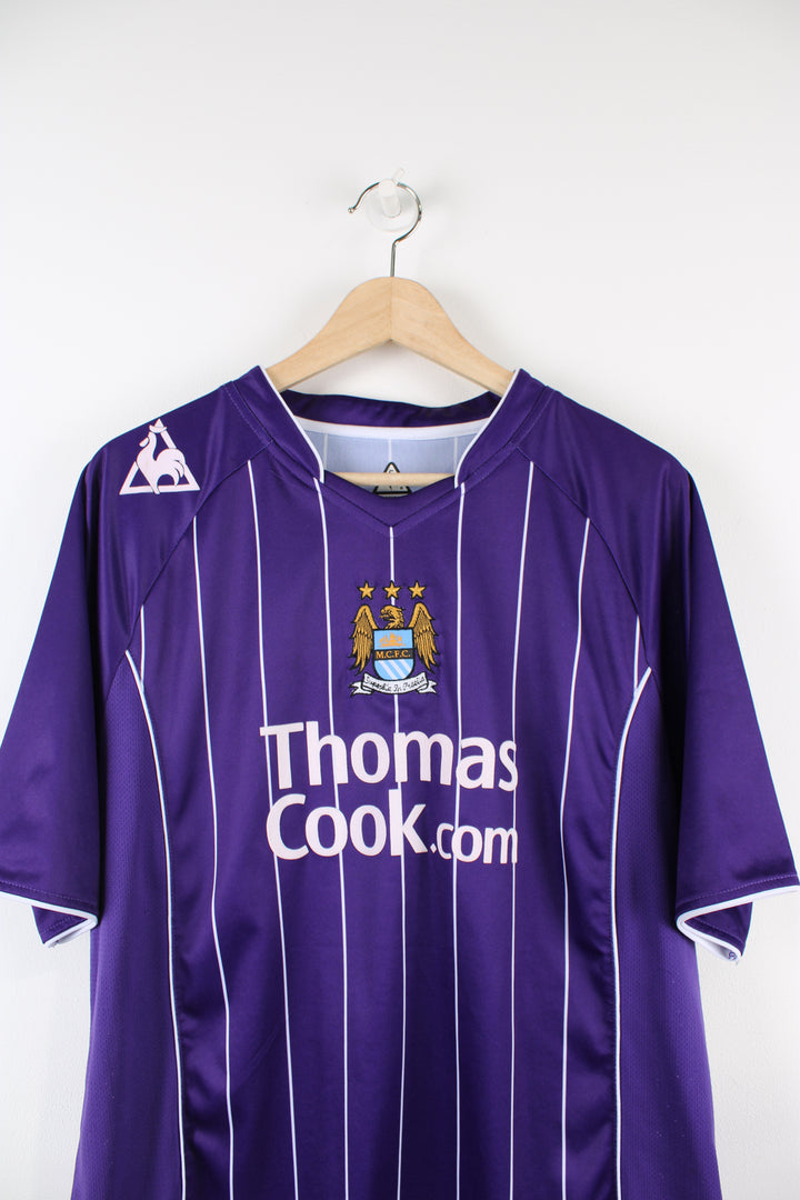 Manchester City 2007/08 Le Coq Sportif away football shirt, Ellano number 11 kit, purple and white colourway with embroidered logos on the front.