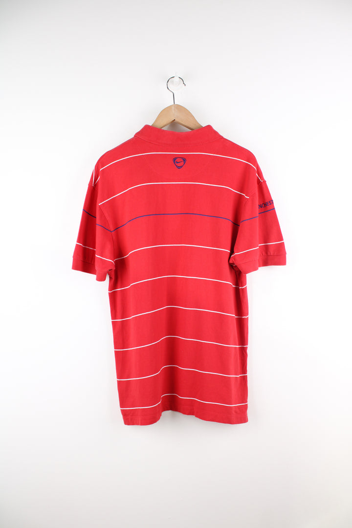 Vintage Manchester United, Nike Polo Shirt in a red, white and blue striped colourway, button up and has logos embroidered throughout the shirt.