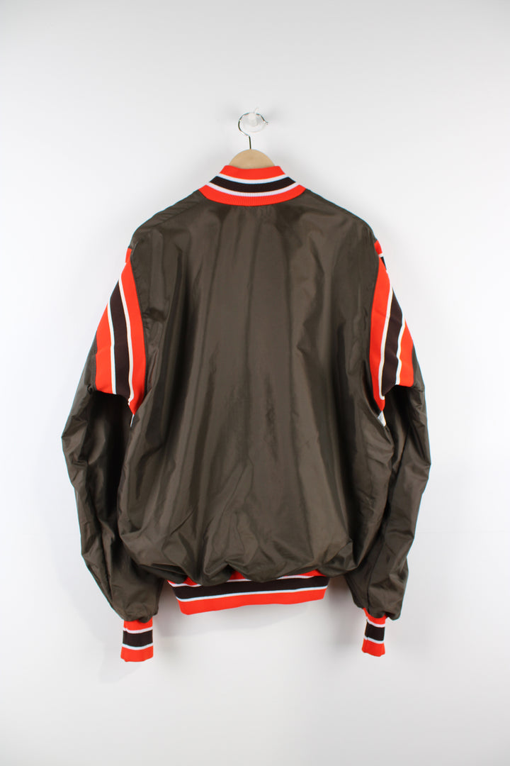 Vintage Cleveland Browns NFL pullover jacket, brown, white and orange team colourway, half zip up, front pocket, and has Browns spell-out and logo across the front. 