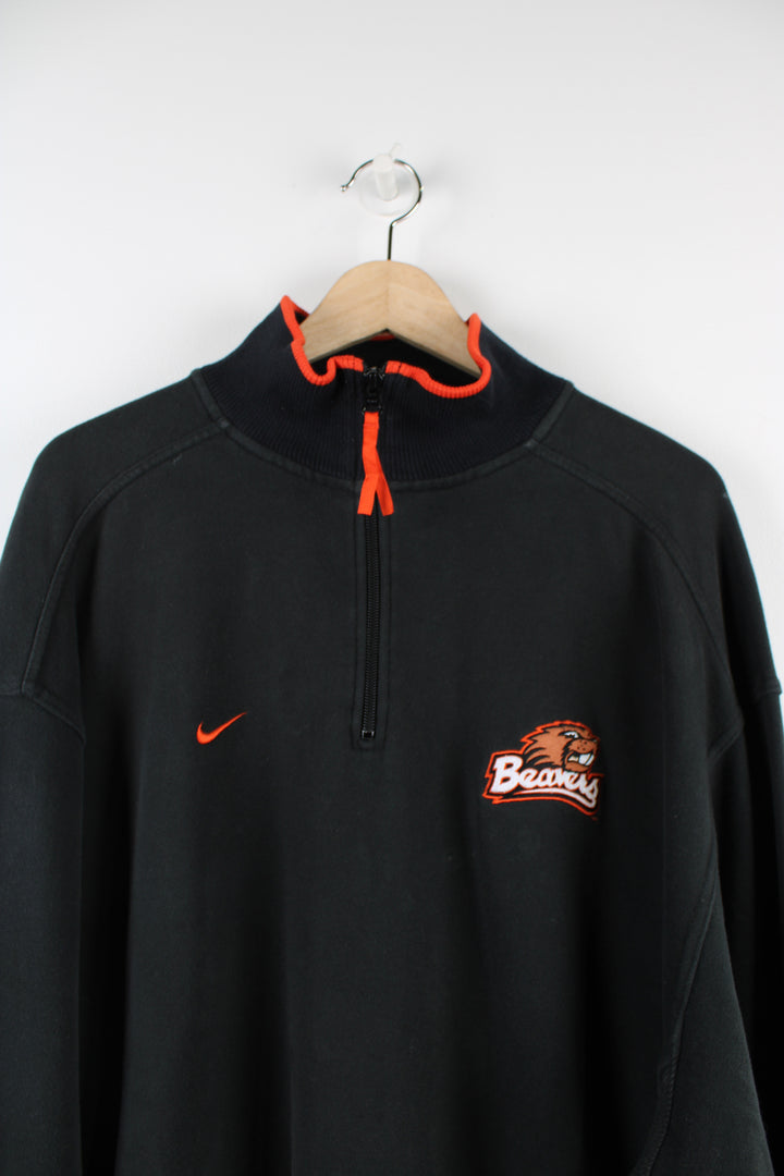 Vintage Nike Beavers, Oregon State University Hockey sweatshirt, quarter zip up with two side pockets and has embroidered logos. 