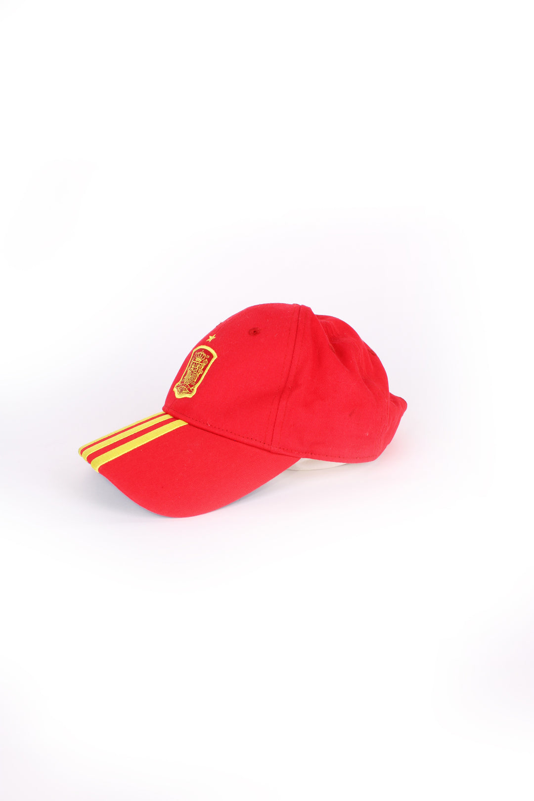 Adidas Football, Spain cap in red and yellow country colours but blue under the peak, 100% cotton, Spain football flag embroidered on the front, and has Adidas stripes as well.