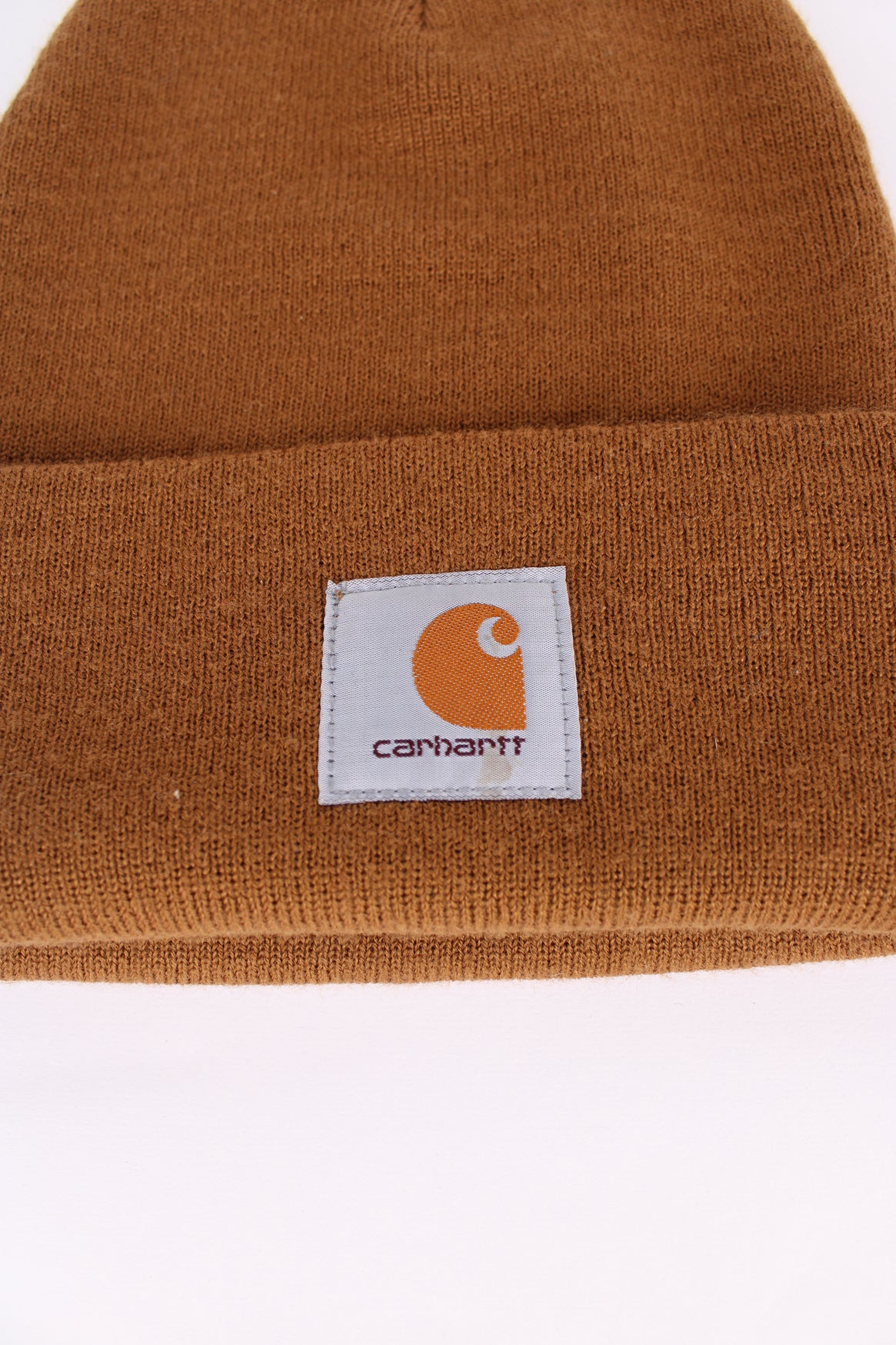 Carhartt brown beanie, cuffed with embroidered logo on the front. 