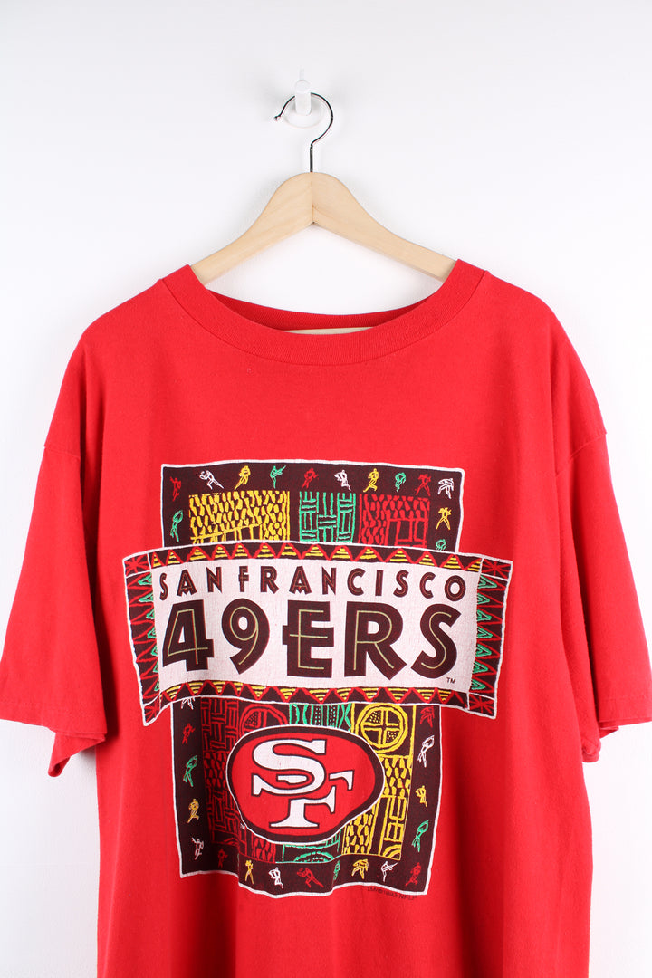 Vintage 1993 red, single stitch San Francisco 49ers t-shirt by Logo 7. Features spell-out graphic on the front and Logo 7 tab on the sleeve