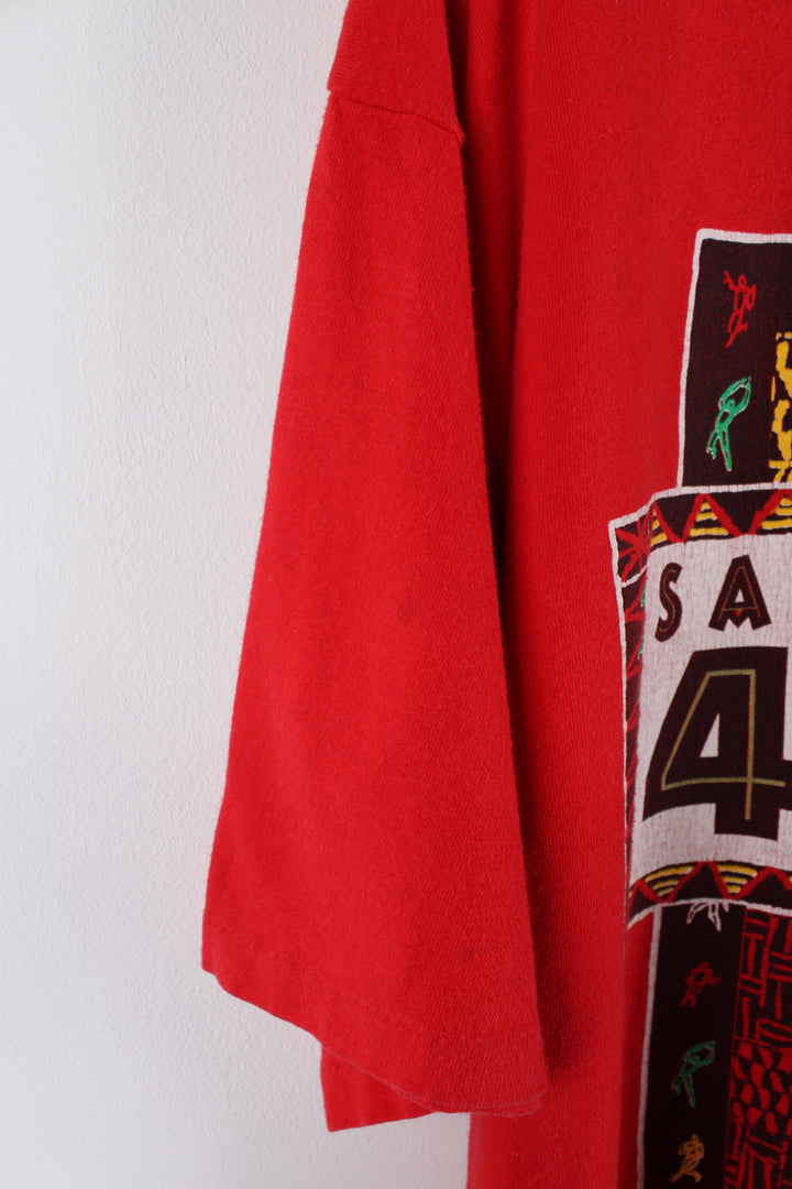 Vintage 1993 red, single stitch San Francisco 49ers t-shirt by Logo 7. Features spell-out graphic on the front and Logo 7 tab on the sleeve