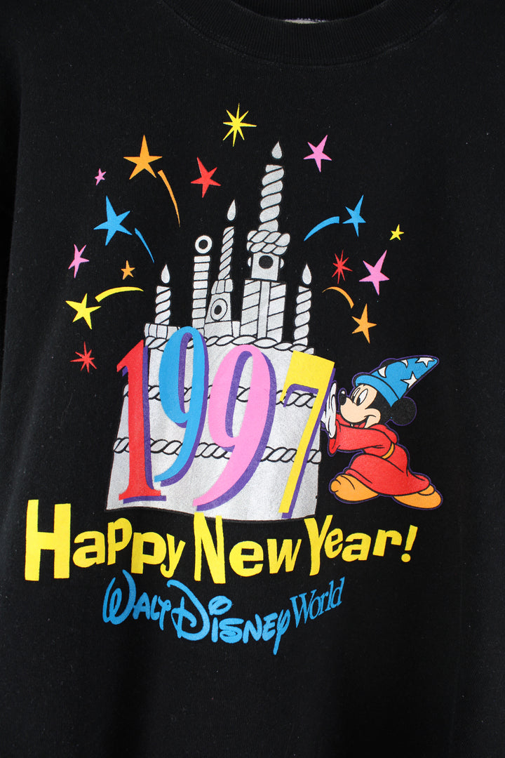 Vintage Disney World black crewneck sweatshirt with printed '1997 Happy New Year' graphic on the front