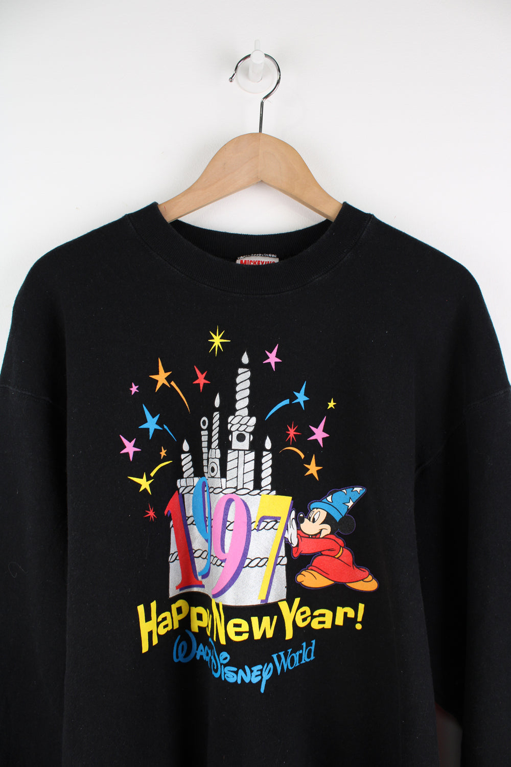 Vintage Disney World black crewneck sweatshirt with printed '1997 Happy New Year' graphic on the front