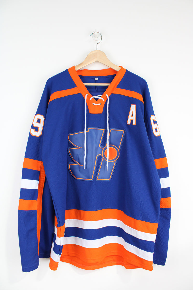 Blue and orange #69 Doug Glatt Halifax Highlanders NHL jersey, with embroidered lettering and badges.